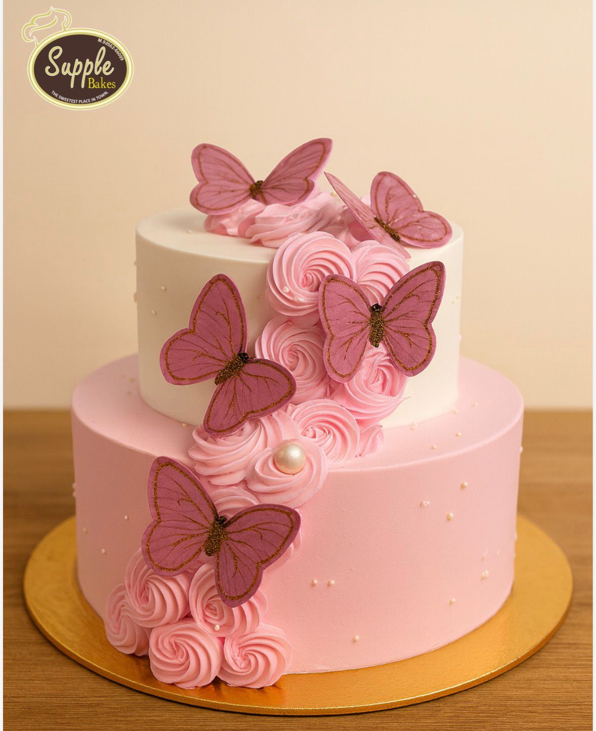 Elegant Pink Rosette Butterfly Cake